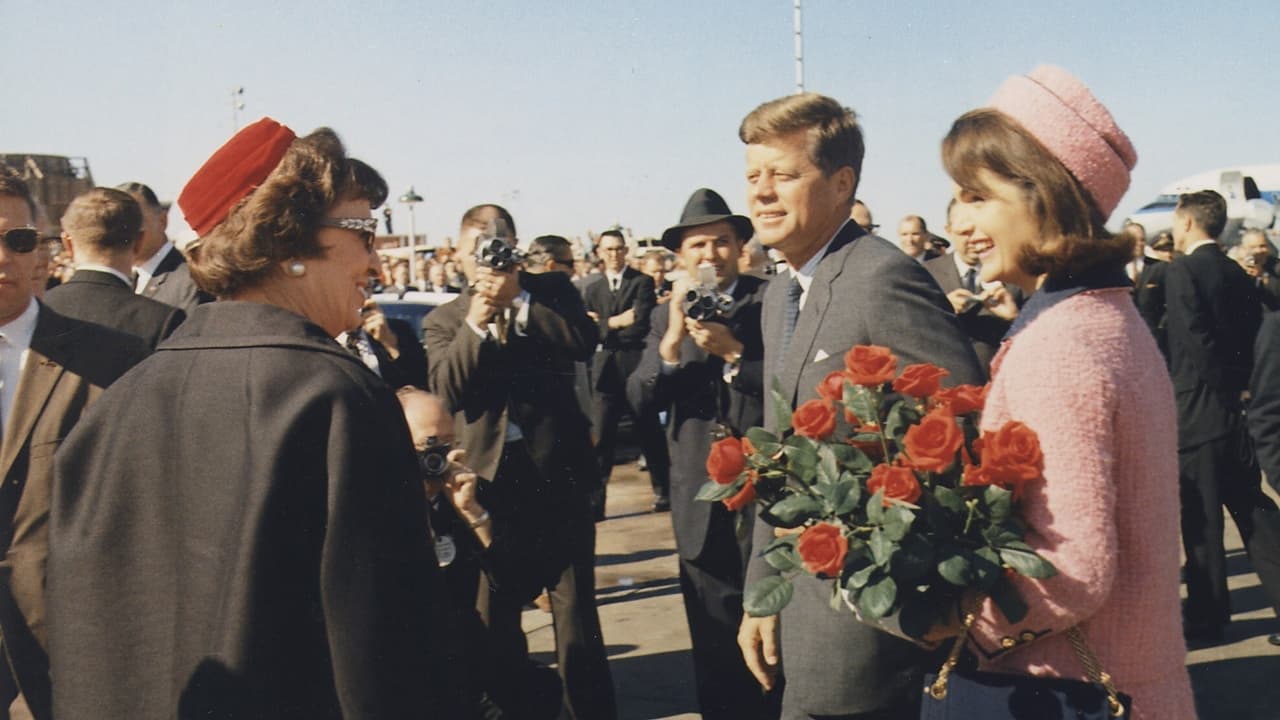 JFK Revisited: Through the Looking Glass Backdrop